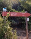 Palia (Old) Kavala Footpath, historical hiking route Mother of the Water inside the woods, wooden sign